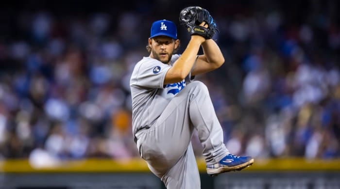 Dodgers pitcher Clayton Kershaw throws against the Diamondbacks.